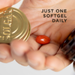 One red softgel capsule of Solgar Hair Growth, being poured from an amber glass bottle into a hand. Text on the image reads, "Just one softgel daily"